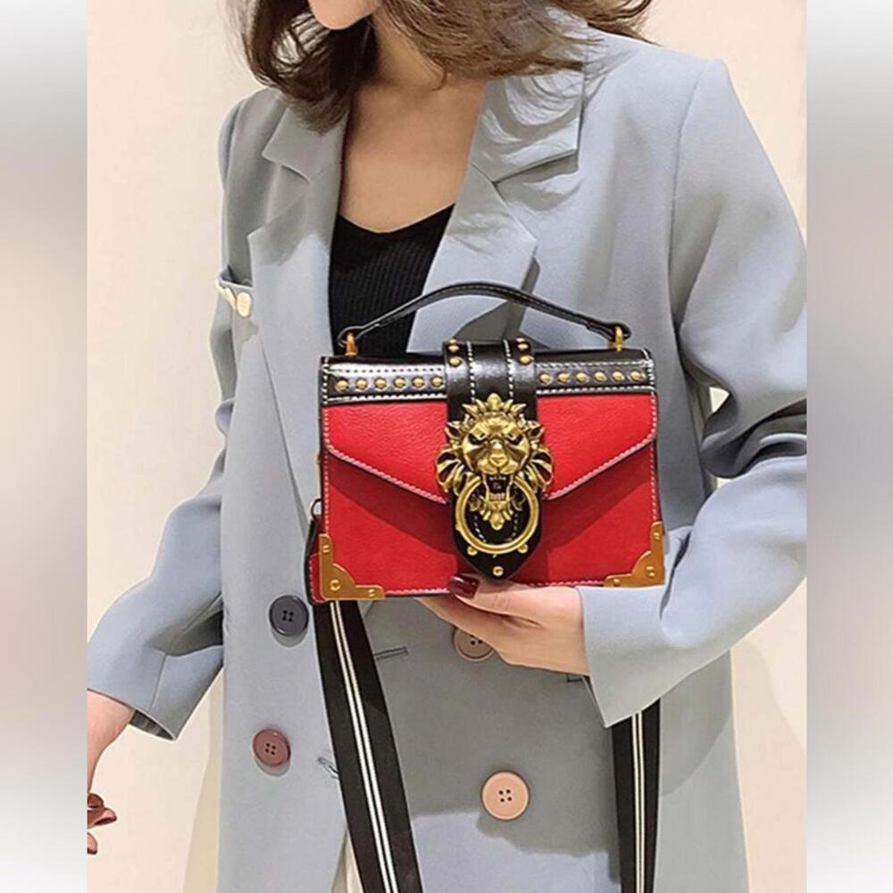 Stylish Red and Black Handbag with Gold Accents - Picture 2 of 6